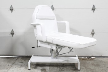 Chair, Medical, MEDICAL/DENTIST/SALON/MASSAGE, WHITE PADDED REMOVEABLE ARM RESTS, PADDED HEAD REST & FACE HOLE FOR MASSAGE, TILTS, SWIVELS, RAISES & LOWERS, AGED, METAL BASE (22x41.5