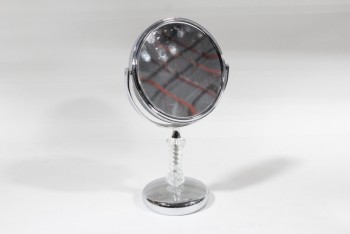 Mirror, Vanity, ROUND FACE ON BASE, TILTS, CLEAR PLASTIC TWISTED STEM, REFLECTIVE CHROME LOOK, PLASTIC, SILVER