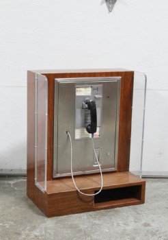 Phone, Payphone, INDOOR, PARTIAL BOOTH / SURROUND W/PLEXI SIDES, DARK BROWN LAMINATE SURFACE, LOWER SHELF, WALLMOUNT, PUBLIC, INCLUDES PHONE & RECEIVER, CIRCA 1970, STAINLESS STEEL, BROWN