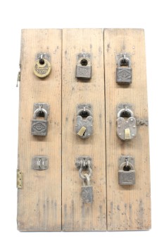 Wall Dec, Collection, CLEARABLE, DISPLAY OF DIFFERENT ANTIQUE PADLOCKS ON OLD WOOD DOOR, WOOD, BROWN