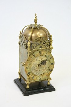 Clock, Mantle, ANTIQUE LANTERN CLOCK W/ROMAN NUMERALS,ROUNDED TOP, FLORAL DECORATION, ORNATE HAND (1 MISSING), SQUARE WOOD BASE - Condition Not Identical To Photo, BRASS, BRASS