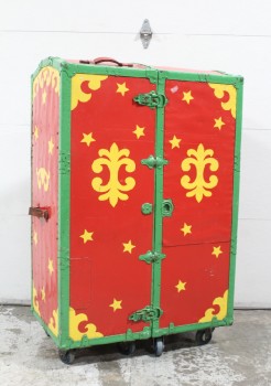 Trunk, Chest, UPRIGHT W/4 WHEELS EITHER SIDE, RED W/YELLOW SHAPES & STARS, GREEN TRIM, BLUE INTERIOR W/YELLOW STARS, ROLLING, CIRCUS, CARNIVAL, MAGICIAN, RED