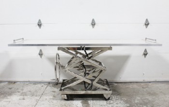 Medical, Morgue, TABLE W/FLAT SURFACE FOR BODY TRANSPORT OR AUTOPSY, LARGE WHEEL FOR HYDRAULIC LIFT OR TO RAISE/LOWER, SCISSOR LIFT BASE, ROLLING, STAINLESS STEEL, SILVER