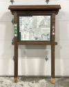 Sign, Stand, POST / KIOSK FOR SIGN / DIRECTORY / INFORMATION / MAP, PEAKED TOP W/TIMBER FRAME, RUSTIC, CAMPING, NATURE, FOREST, TRAILHEAD, HIKING TRAIL, PUBLIC  OR STATE / PROVINCIAL PARKS, WOOD, BROWN