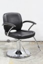 Chair, Salon, BARBER SHOP / HAIRDRESSER, ADJUSTABLE HEIGHT (33 TO 44") W/FOOT PUMP, PADDED ARMS, CHROME FOOT RUNG & ROUND BASE W/22" DIAMETER, VINYL, BLACK