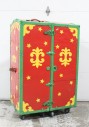 Trunk, Chest, UPRIGHT W/4 WHEELS EITHER SIDE, RED W/YELLOW SHAPES & STARS, GREEN TRIM, BLUE INTERIOR W/YELLOW STARS, ROLLING, CIRCUS, CARNIVAL, MAGICIAN, RED