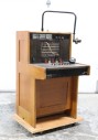 Phone, Switch Board, FREESTANDING MANUAL TELEPHONE OPERATOR CORD BOARD COUNTER STATION W/11" TRANSMITTER BRACKET, OAK, CIRCA 1930, JUST SWITCHBOARD W/O ROLLING BASE IS 46x24.5x29.5", WOOD, BROWN